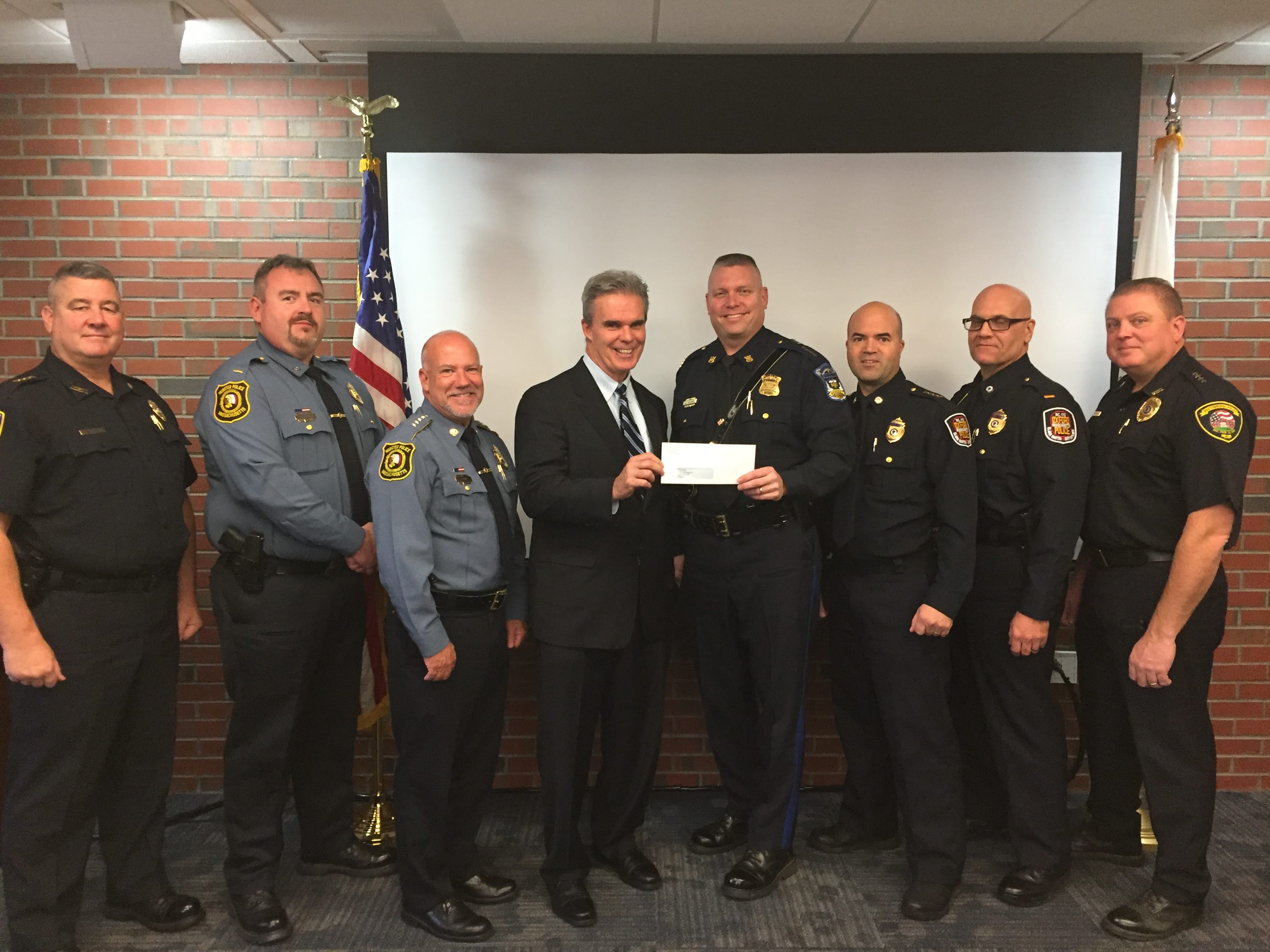 Local Drug Task Force Presented With Donation From District Attorney